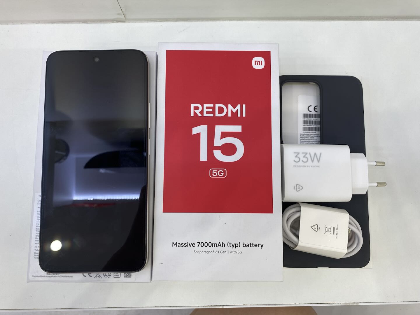 ĐIỆN THOẠI DI ĐỘNG (TEL) REDMI 15 5G 6.9"/SNAP 6S GEN 3/8G/256G/50MP+Auxiliary/8MP/7000mAh (25057RN09G)/XÁM